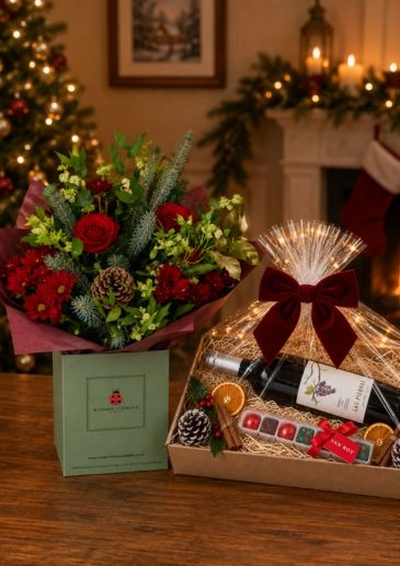 Christmas gift bundle including a flower bouquet, Red wine and chocolates